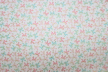 Riley Blake Printed Cotton -  Bouncing Bows Cream 112cm
