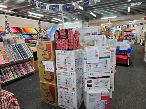 A store with many boxes

AI-generated content may be incorrect.